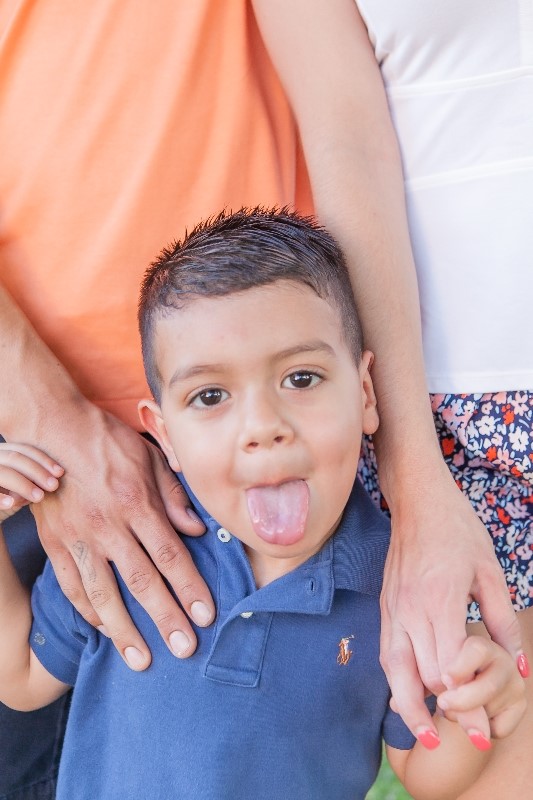 Child sticking his tongue out