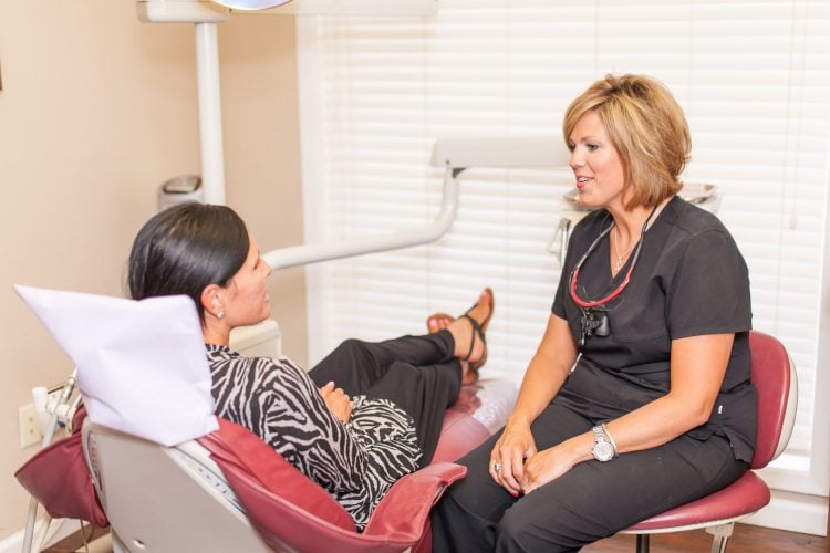 Dr. Smart talking to a patient