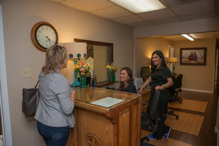 Smart Family Dentistry staff member welcoming a new patient