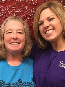 Dr. Smart and a patient with new dentures