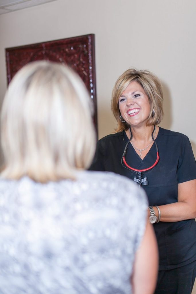 Dr. Smart talking to a patient