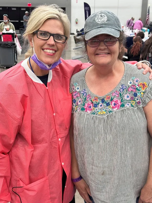 Doctor smiling with happy patient