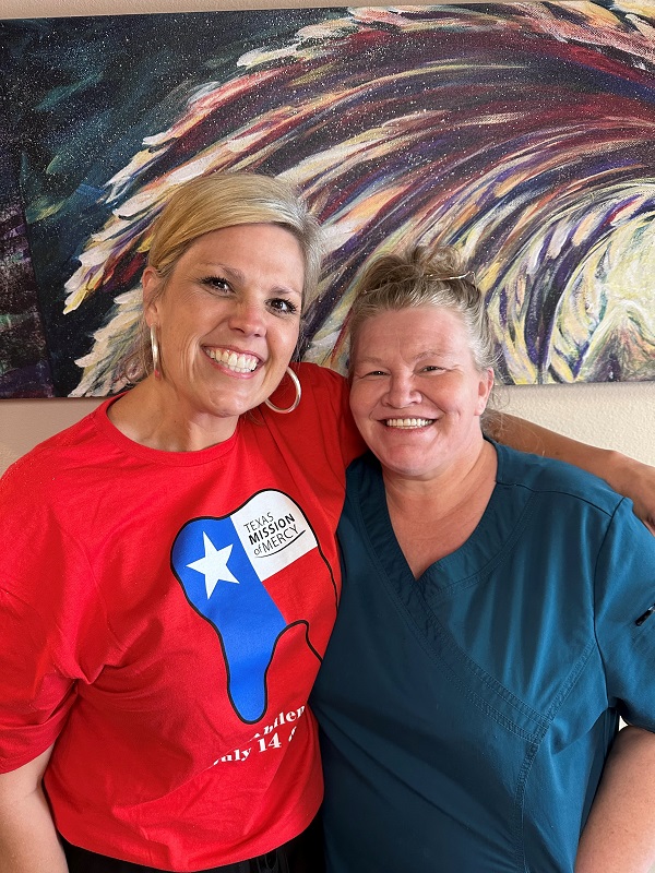 Dr. Lyndi Smart with patient after treatment
