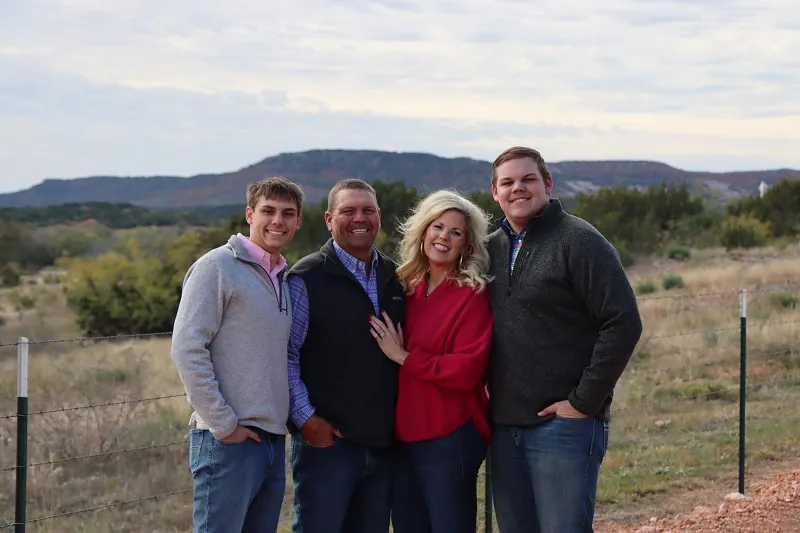 Dr. Lyndi Smart with family outdoors