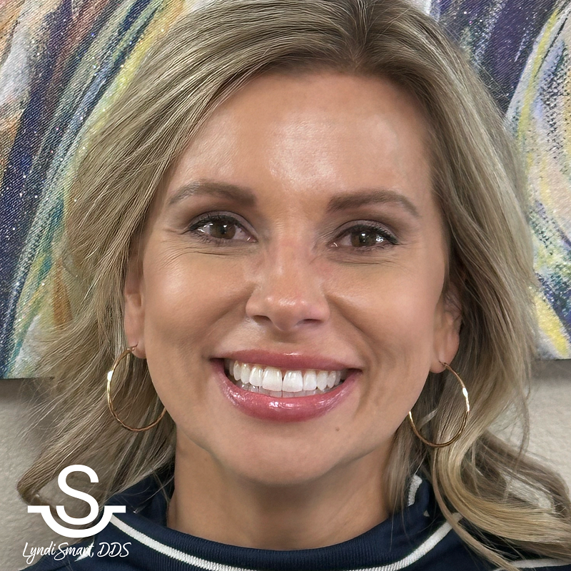 Patient smiling after her Invisalign treatment